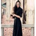 فستان طويل باللون الأسود ذات أكمام طويلة وفتحة أمامية مثيرة