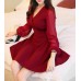 فستان أحمر قصير شتوي بأكمام طويلة وتنورة واسعة يمنحك إطلالة ساحرة