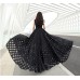 فستان أسود طويل بدون اكمام يمنحكي إطلالة الأميرات