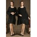 فستان أسود فضفاض وقصير بأكمام طويلة بتصميم بسيط وجذاب