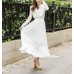 فستان أبيض طويل بأكمام طويلة ورقبة دائرية يمنحكي إطلالة ساحرة